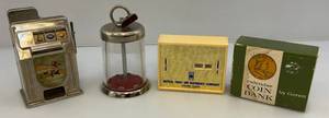lot 31 image: Three Vintage Coin Banks