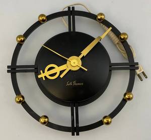 lot 43 image: Seth Thomas Silouette MCM Wall Clock Atomic Age Wall Clock