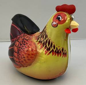 lot 300 image: 1960s QSH Brand Tin Litho Battery Operated Egg Laying Chicken With Eggs (Works Make Chicken Noise And Lays Eggs)