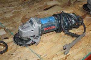 lot 970 image: Bosch 4-12 Angle Grinder 1V10A