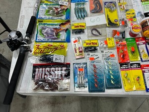 lot 60 image: TABLE FULL OF FISHING RODREEL, SNELLS, LINE, PLASTICS, JIGS, SPOONS, WEIGHTS, LEADERS, SPINNERS, HOOKS, & LURES