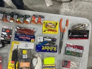 lot 8 image: TABLE FULL OF SNELLS, SPINNERS, HOOKS, LEADERS, LINE,  ROD