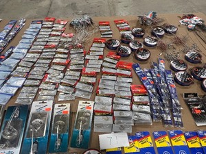 lot 71 image: HUGE TABLE OF SPLIT RINGS, LINE, SNELLS, SWIVELS, TROLLING PLANERS, WALLEYE RIGS, LEADERS, & LINE