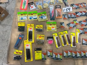 lot 159 image: TABLE OF PLASTICS, JIGS, LEADERS DIVERS, SPINNERS & 2 RODS