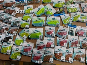 lot 162 image: HUGE TABLE FULL OF FISHING PLASTICS