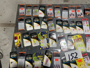 lot 152 image: TABLE FULL OF SPINNERS, JIGS, MICRO JIGS, & ICE JIGS