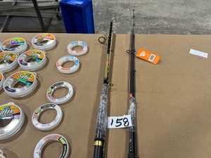 lot 158 image: TABLE FULL OF MONO LEADER & 2 RODS