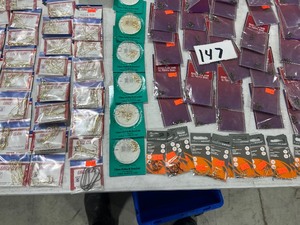 lot 147 image: TABLE FULL OF HOOKS