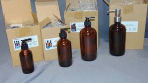 lot 126 image: 12 Mixed Sizes Cornucopia  Glass Pump Bottles  Amber Brown), Lotion Soap Dispensers wBlack Plastic Pumps