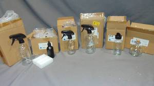 lot 132 image: 18  Mixed Cornucopia Glass Bottles Includes Chalk Labels