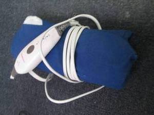 lot 38 image: Out of Box Heating Pad powers on...