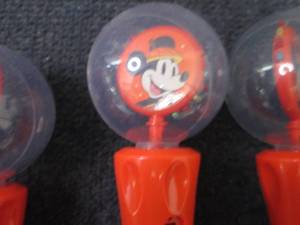 lot 53 image: 4 Mickey Mouse Spinners...