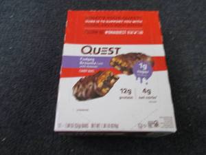 lot 297 image: 12 Quest Fudgey Brownie Candy Bars...