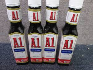 lot 303 image: 4- 5 oz A1 Original Sauce Best Date...