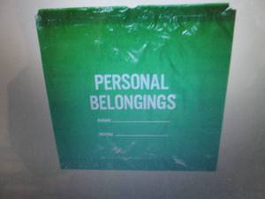 lot 446 image: Medegen 50-53 Green Personal Belong...