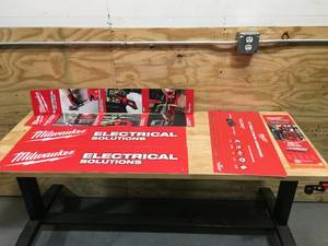 lot 38 image: Lot of 6 - Milwaukee Display Signs (2 have Adhesive Backs)