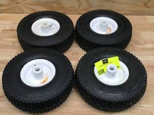 lot 40 image: Lot of 4 - 4.103.50-4 Tires Max Load 450 lbs at 30 PSI cold