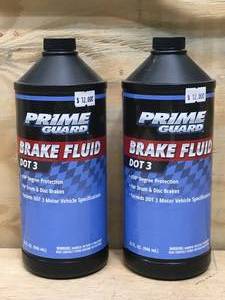 lot 65 image: Lot of 2 - Prime Guard Brake Fluid DOT 3 32 Fl Oz Bottles