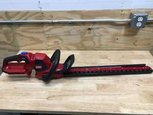 lot 69 image: 60V MAX 24 in. (60.96 cm) Hedge Trimmer Model # 51840 (Battery And Charger Included)