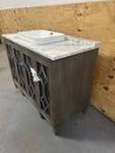lot 7 image: Kathy Ireland Home Southport 48-in Cashmere Oak Semi-recessed Single Sink Bathroom Vanity with Carrara Natural Marble Top and Backsplash (Retails for $1799)