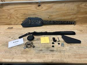lot 121 image: Donner HUSH-I Guitar For Travel - Portable Ultra-Light and Quiet Performance Headless Acoustic-Electric Guitar, Maple Body, Gig Bag, and Accessories