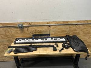 lot 124 image: Starfavor 88 key keyboard piano, Compact Portable Digital Piano with Semi Weighted 88 Keys, Electric Keyboard Set for Beginners with Stand, Headphone, Sustain Pedal, Carrying Case