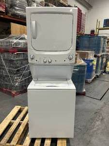 lot 167 image: GE Unitized Spacemaker 3.8 cu. ft. Capacity Washer with Stainless Steel Basket and 5.9 cu. ft. Capacity Electric Dryer Model # GUD27ESSM1WW (Untested Scratch And Dent)