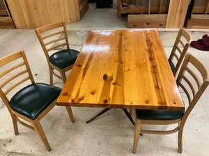 Low top Pine finished table with 4  hardwood padded chairs