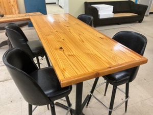 High top Pine finished table with 4 swivel bar stools