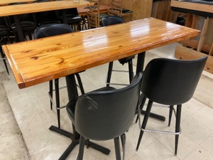 High top Pine finished table with 4 swivel bar stools