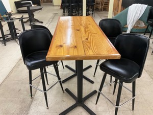 High top Pine finished table with 4 swivel bar stools