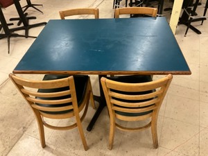 Low top bar table with 4 padded hard wood chairs