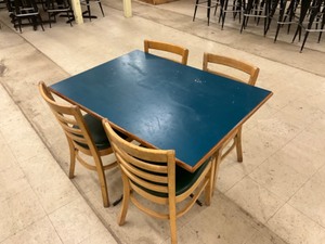 Low top bar table with 4 padded hard wood chairs
