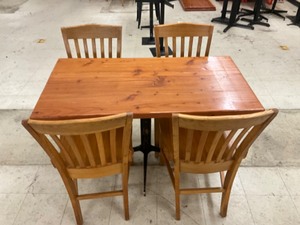 Low top bar table with 4 oak chairs