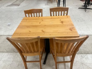Low top bar table with 4 oak chairs