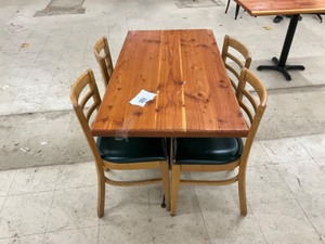 Low top bar table with 4 padded hardwood chairs