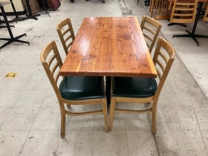 Low top bar table with 4 padded hardwood chairs