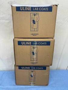 lot 216 image: 3 Cases (25 coats per case) NEW Uline White Water Resistant Lab Coat - No Pockets Snap Front&nbspclosure for ultimate comfort & convenience. Breathable spunbond material protects from dust and grime- Size 4XL 