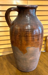 lot 52 image: Two Decorative Pottery Pitchers with Handles