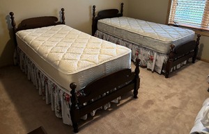 lot 24 image: Two Beautiful Vintage Twin Beds with Bedding