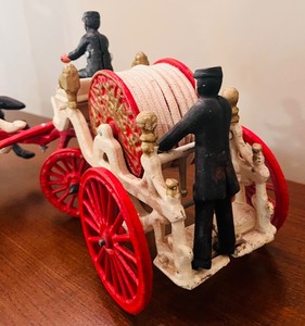 lot 300 image: Vintage Antique Cast Iron Horse Drawn Fire Engine  Hose Toy