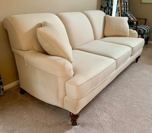 lot 17 image: Elegant Cream Upholstered Sofa