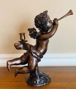 lot 75 image: Decorative Bronze Cherub Candle Holder