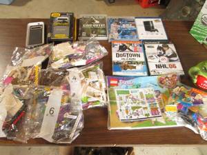 Assortment of Legos, Otterbox Phone...