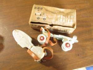Vintage Sear Roebuck strap on rolle...