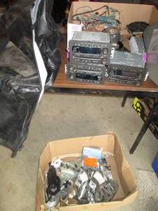 Large box of car radios, mud flaps,...