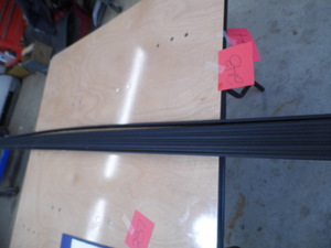 Strips of plastic with slots for fa...