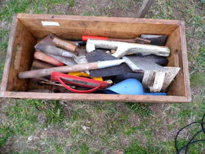 Wood box filled with hand tools...