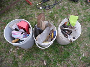 # Buckets of assorted hand tools an...