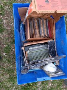 Plastic crate of air gin nails...